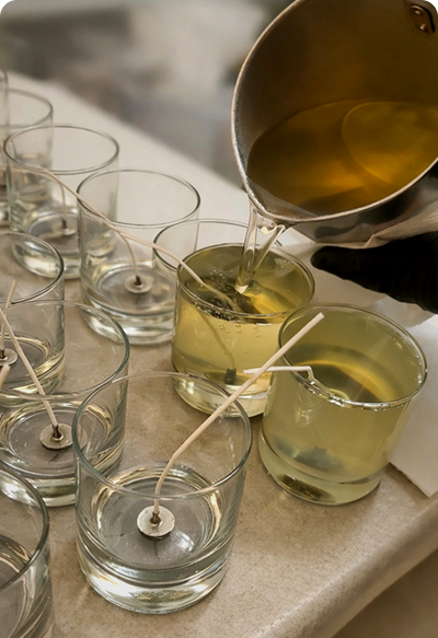 Hand Pouring Into Glass